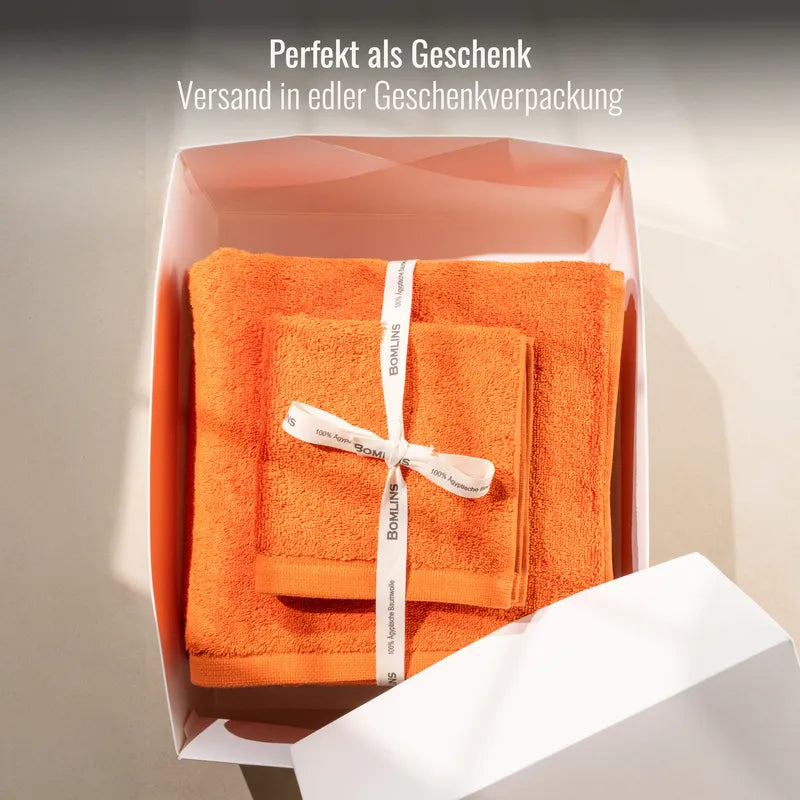 Handtuch Orange als Geschenk verpackt