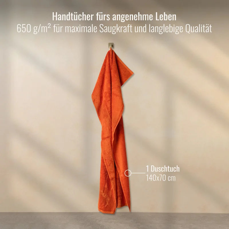 Duschtuch Orange 70x140 cm aufgehängt im Badezimmer