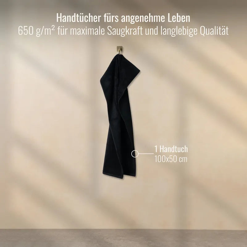 Handtuch Schwarz 50x100 cm aufgehängt im Badezimmer